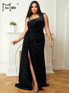 in a black high slit dress