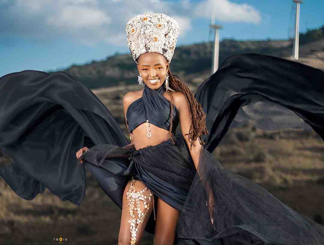 Mungai Eve in a Black maxi dress with extensions