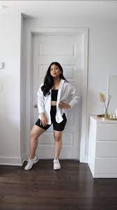 looking good in black biker shorts with a white shirt