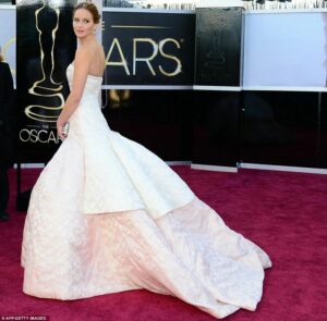 rocking the oscar awards in a expensive dress