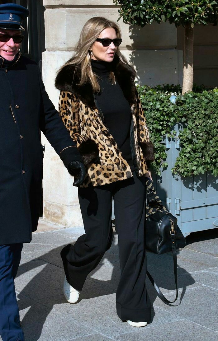 #10. Leopard print jacket: Kate Moss in black baggy trousers and a leopard print jacket 