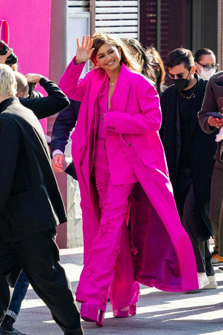 Zendaya attended the Valentino Fall/Winter 2022/2023 show at Paris Fashion Week in a feminine pink suit