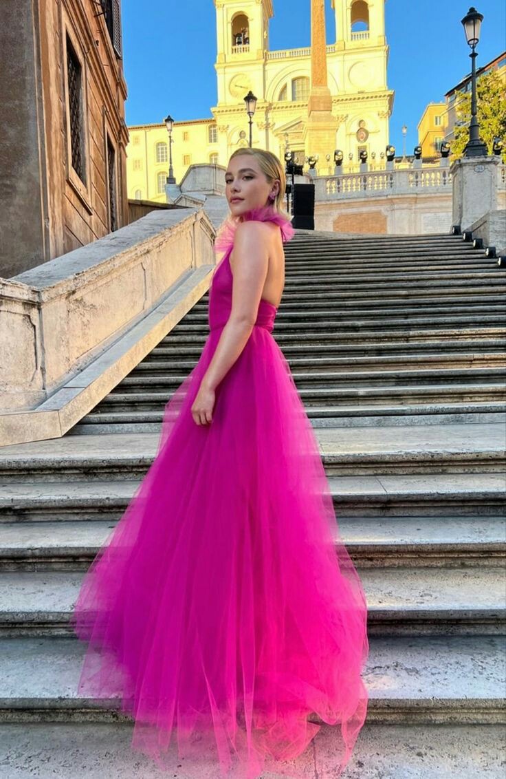 She stepped out rocking a stunning pink sheer backless tulle gown
