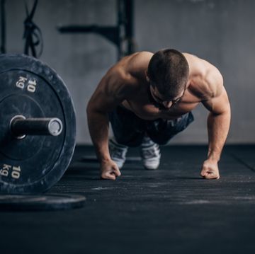 athlete-doing-push-ups-royalty-free-image-1681226481