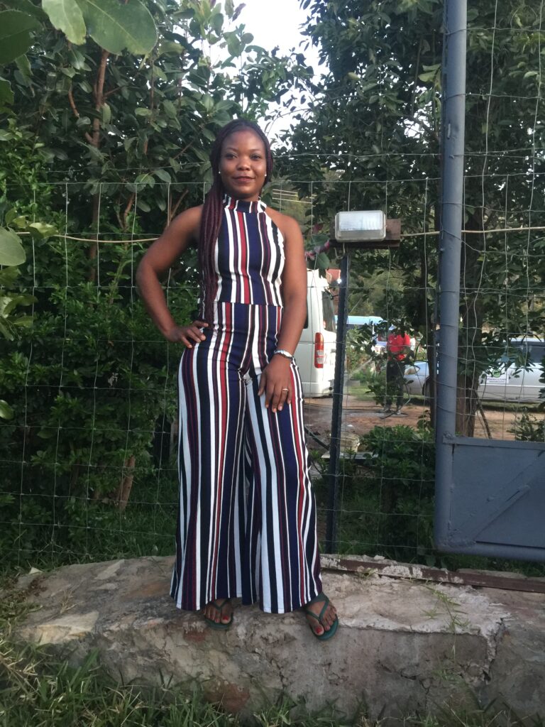 Embracing your curves woman in stunning strpied outfot 