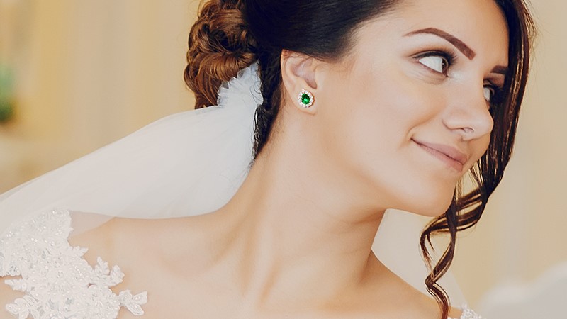 Emerald stud earrings at weddings