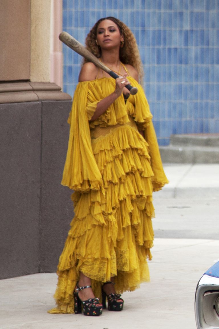 Beyonce outfits yellow dress