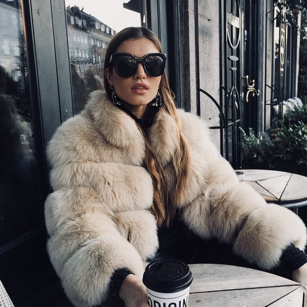 cozy outfits for winter fur jackets and jeans