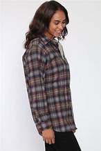 Girl wearing a flannel shirt