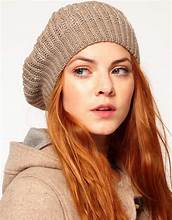 Winter hats girl with redish hair wearing baret