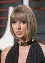 Taylor Swift's fashion evolution Gold choker 