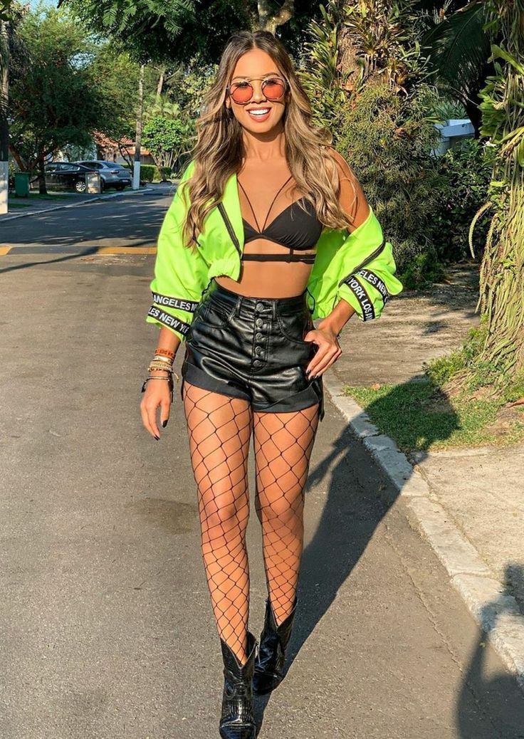 Freaknik Festival Outfit bakini top with black leather hot pants and fishnet stockings