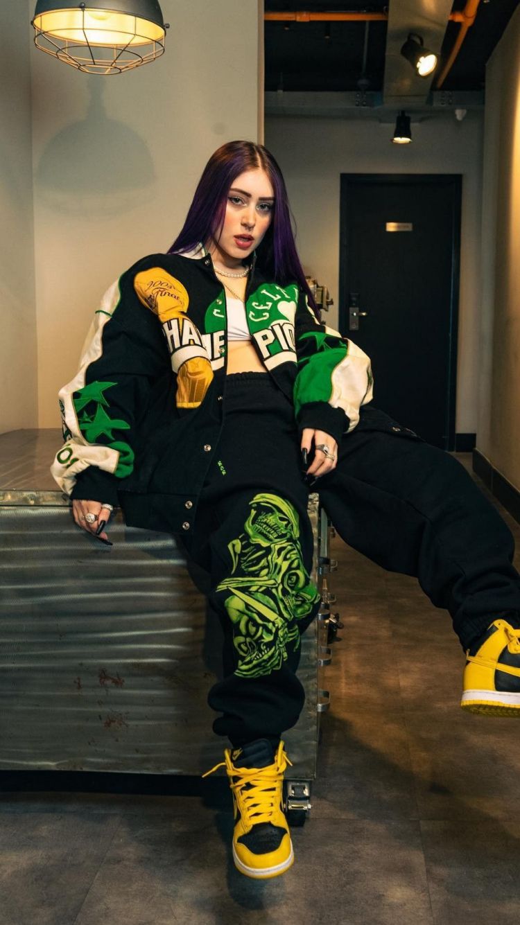 Freaknik Outfits black joggers and Varsity Jacket