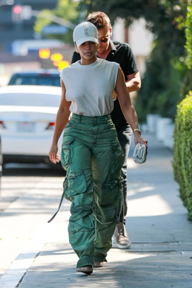 Cargo pants and tank top Lori Harvey's street fashion