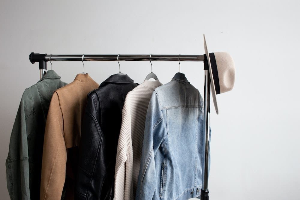 A Gentleman's Wardrobe 002 Men clothes hanging on a rack