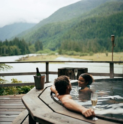 man and woman in a hot tub