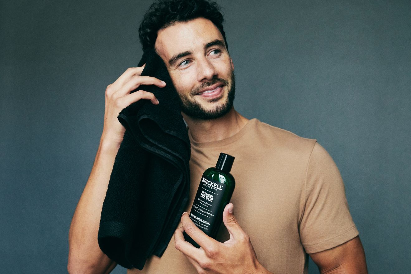 men's style tips man with shampoo bottle