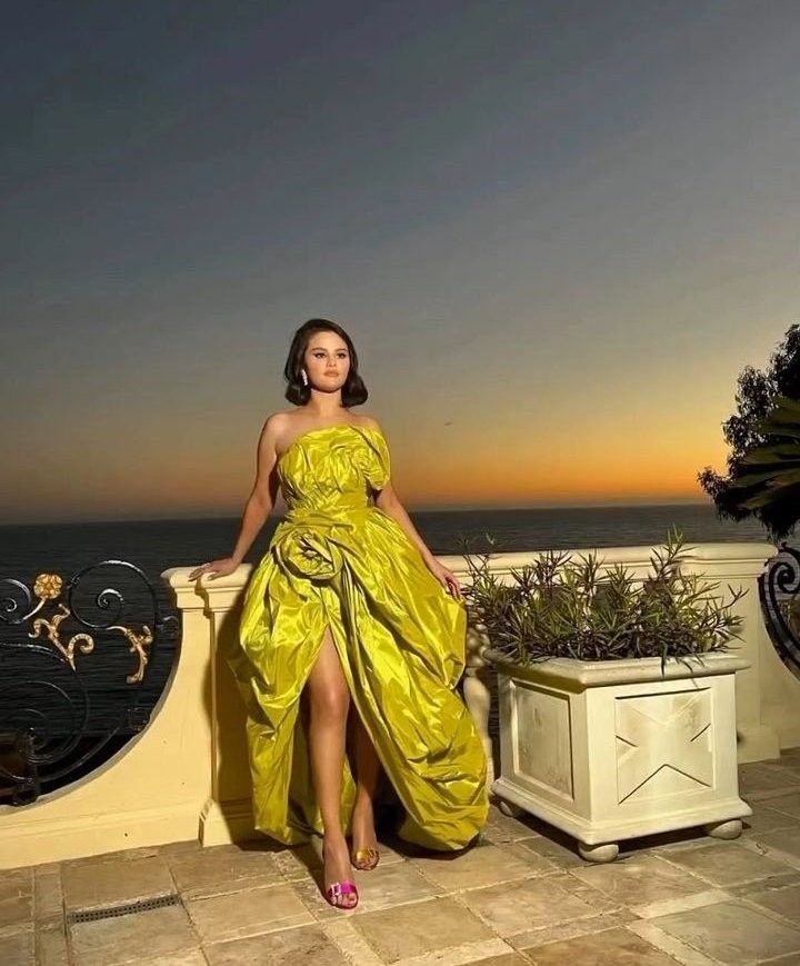 Selena Gomez outfits slit draped gown 