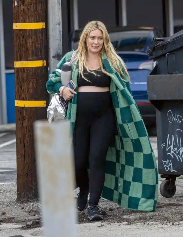 celebrity street-style maternity outfits Hillary Duff in green
