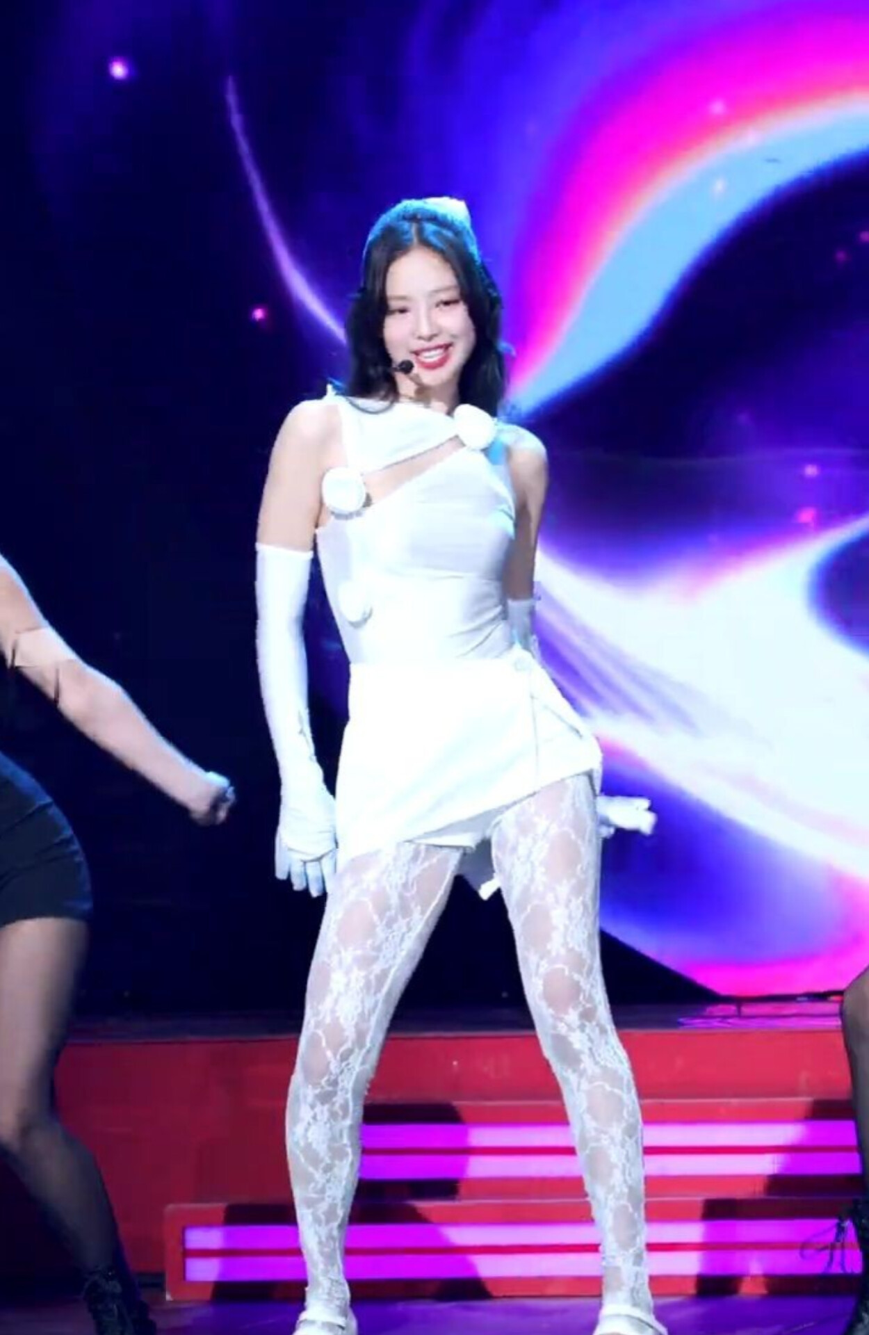 Jennie Kim in white with white stockings