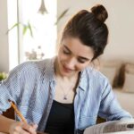 woman wearing blue sapphire necklace