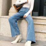 wide-leg jeans white shirt sitting down