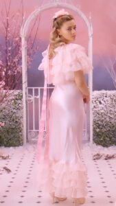 Josephine Langford in a pink dress.