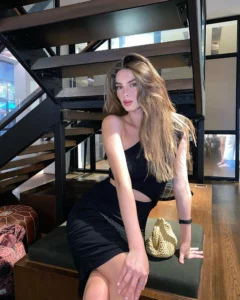 Eden Polani in black