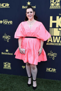 Melanie Lynskey in a pink dress