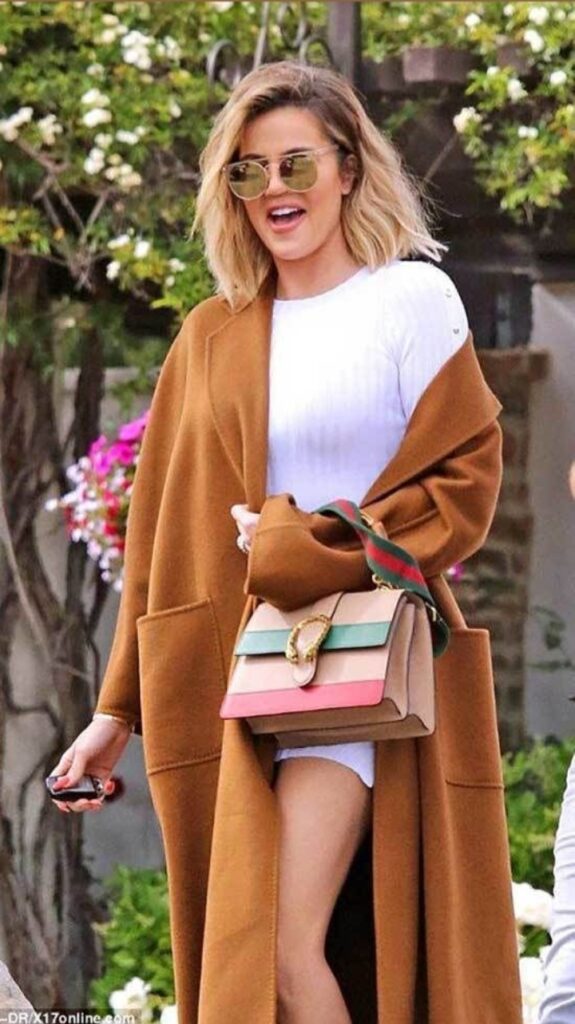 Khloe Kardashian's street style long brown sweater