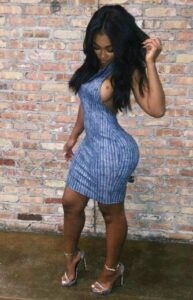 miracle watts in a blue dress