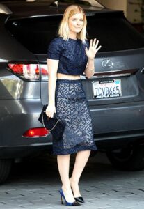 Kate Mara luxurious car and outfit