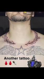 Ryan Garcia displaying his cress chest tattos