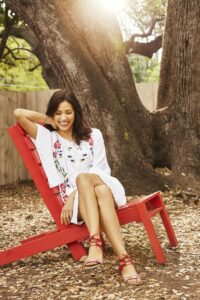 Michaela Conlin beach moments with polka dot white dress