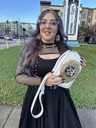 Rhea Ripley long-sleeve black gown