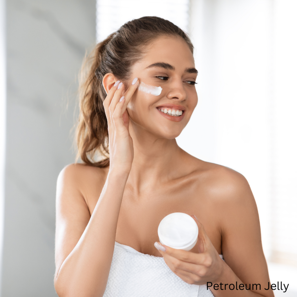 Girl using petroleum jelly on face