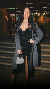 Poonam Pandey with her tyailored black dress