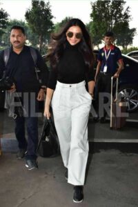 Deepika Padukone with her casual white trouser