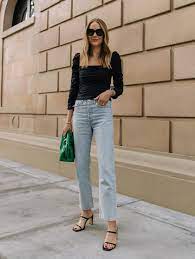 Amy Jackson black top with her sleek jean