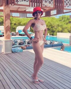 Mandira Bedi with grey lined bikini