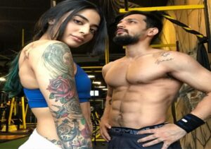 Bani J displays her love draw tattoo