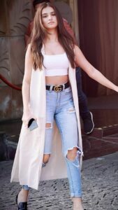Tara Sutaria with her sleek jean paired with white crop top