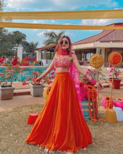 Riya Jain with her bold colored dress
