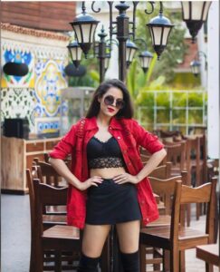 Aakriti Rana black mini dress