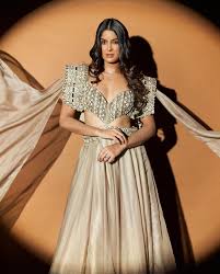 Anisha Dixit with her flowy timeless crem ensemble