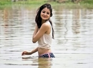 Anushka Sharma with her white top in the beach 
