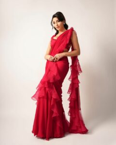 Nora Fatehi sexy in red dress