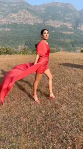Monica Dogra red dress