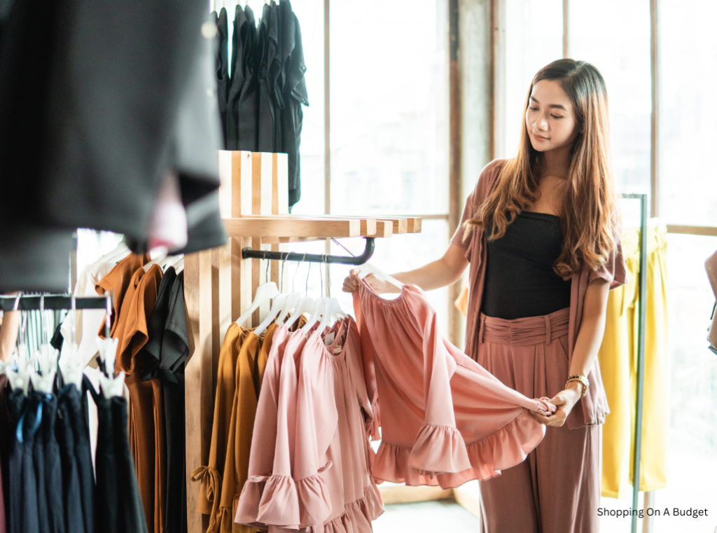 woman shopping for pink top 
