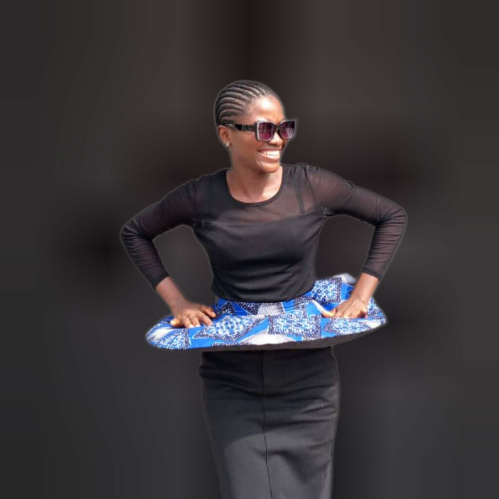 Fehintola E. Komolafe fashion model in black dress